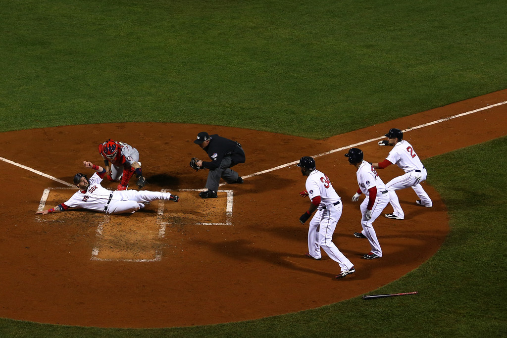 Jonny Gomes slides safely into home