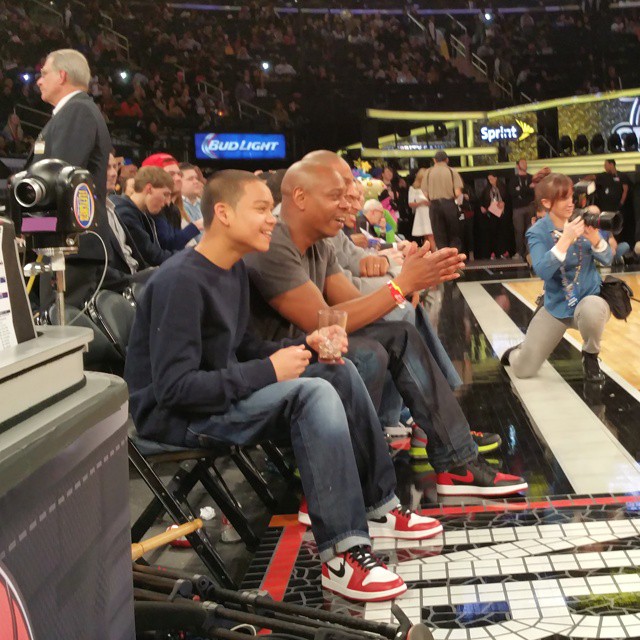 Dave Chappelle wearing Air Jordan I 1 Bred