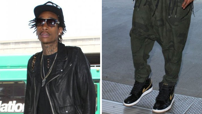 Wiz Khalifa wearing Air Jordan Retro I 1 Black Gold