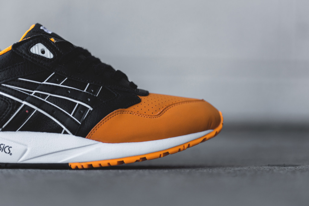 asics gel saga black orange