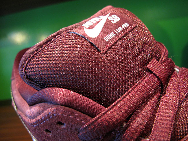 nike slides burgundy and gold