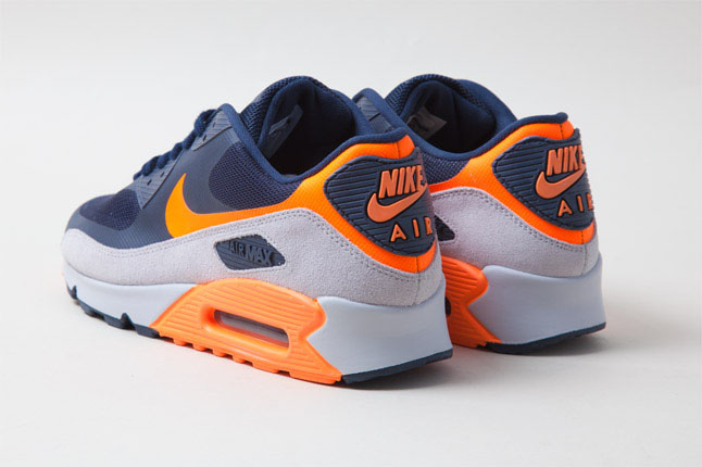 navy and orange sneakers