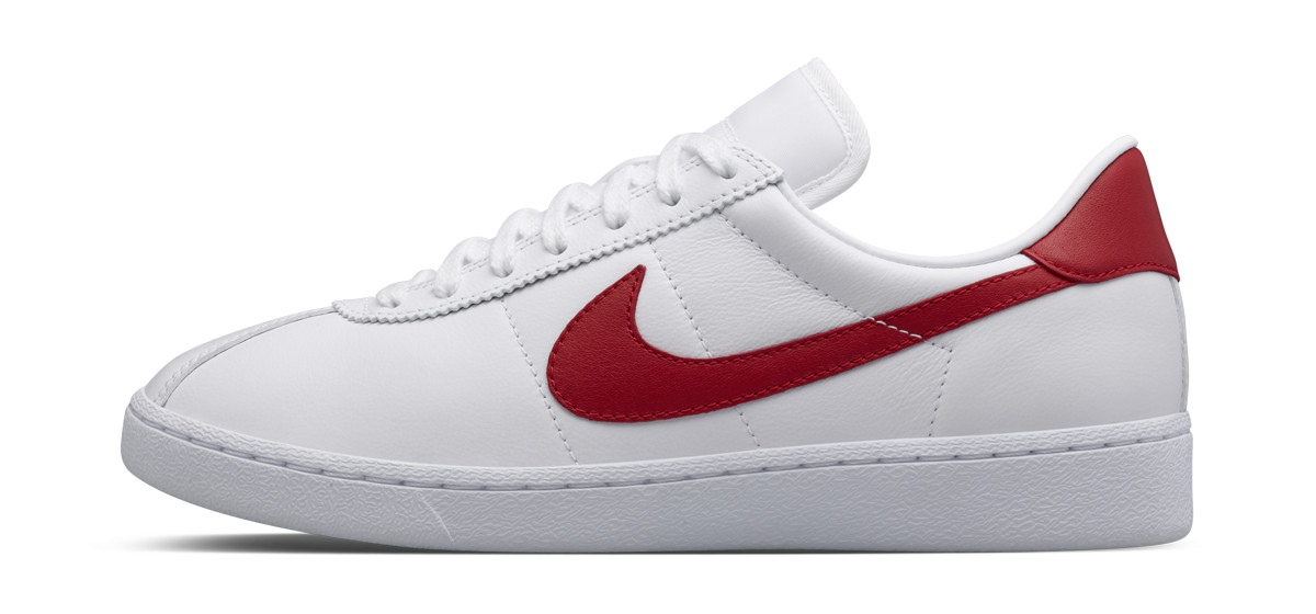 white nike sneakers with red swoosh