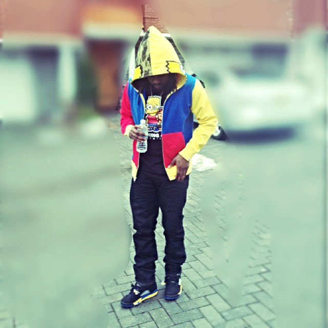 Wale wearing Air Jordan 5 Retro Shanghai