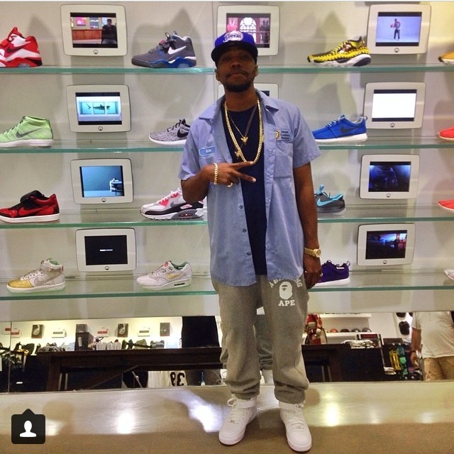 Currensy wearing Nike Air Force 1 Mid