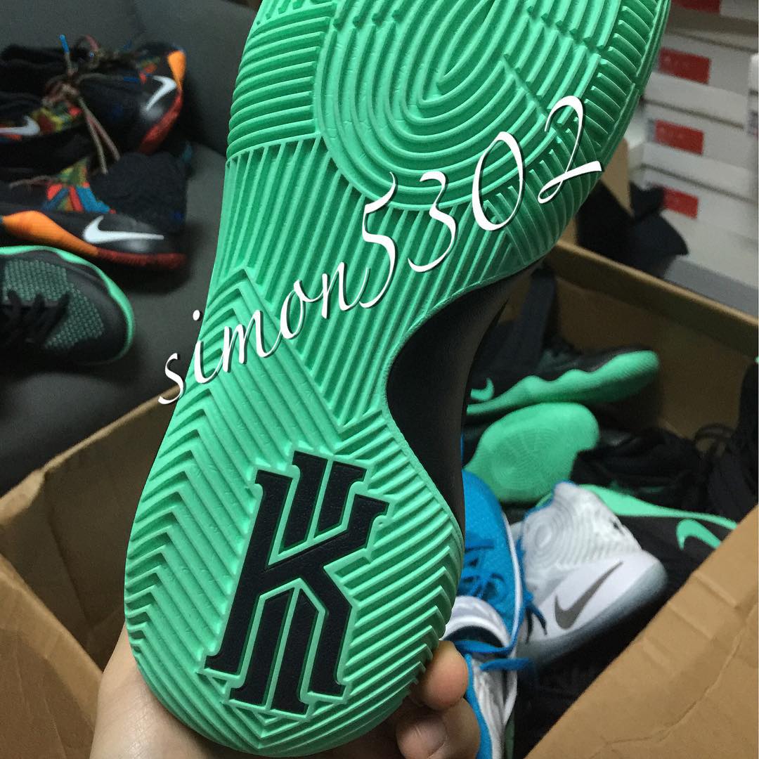 kyrie shoes black and green