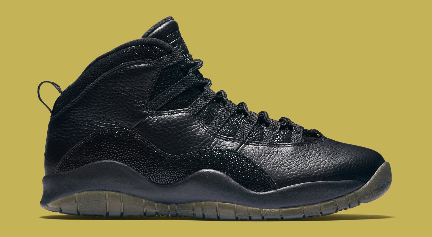 black and gold jordan 10s