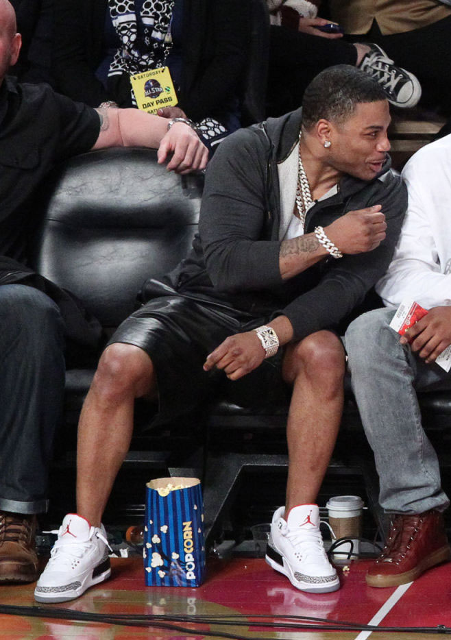 Nelly wearing Air Jordan 3 Cement