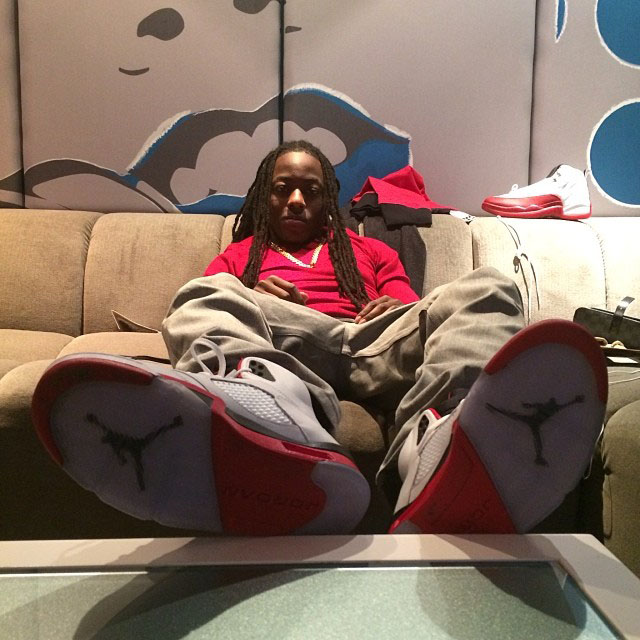 Ace Hood wearing Air Jordan 5 V Retro Fire red