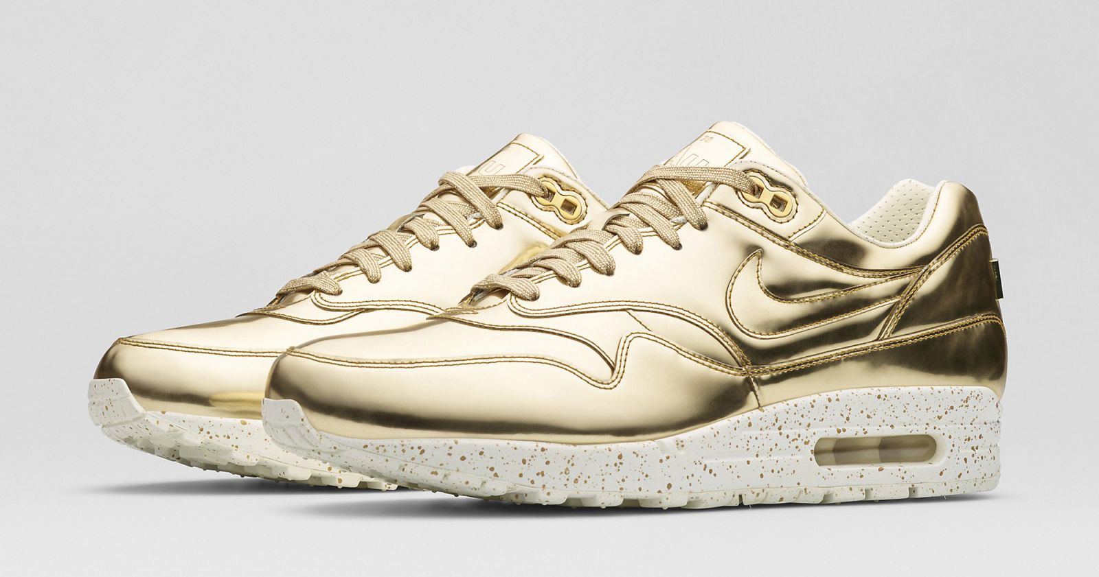 gold nikes mens