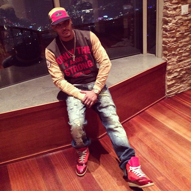 T.I. wearing Maison Martin Margiela High-Top Sneakers