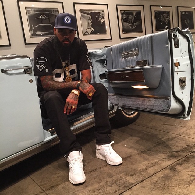 Stalley wearing Pigalle x Nike Air Raid White