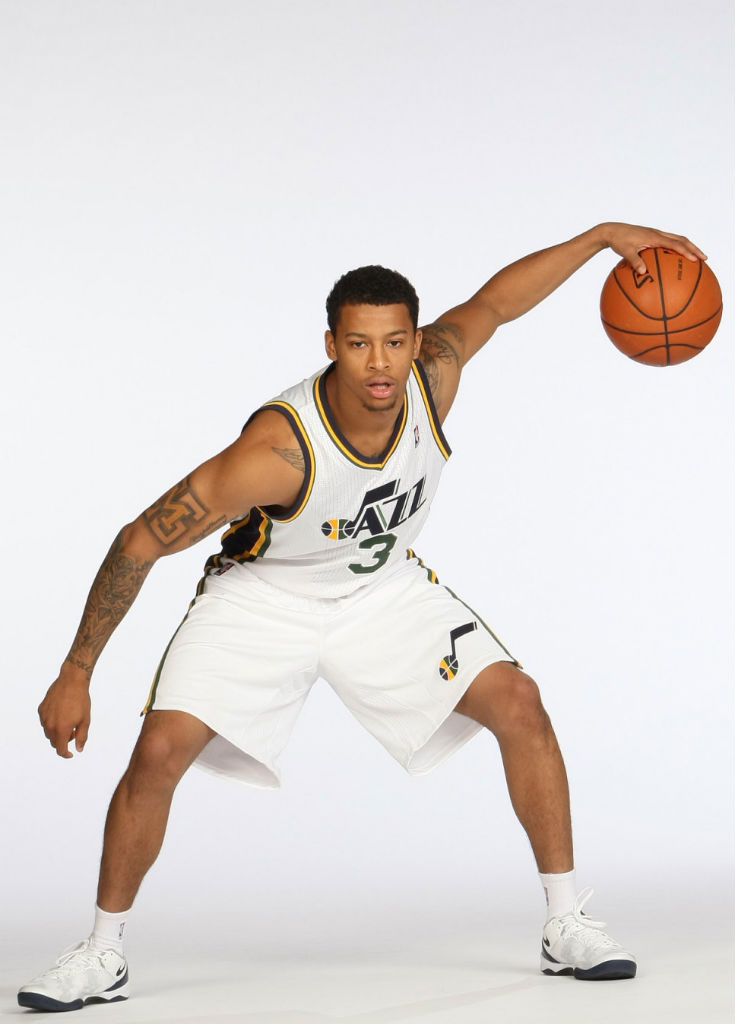 Trey Burke wearing Nike Kobe 8 System