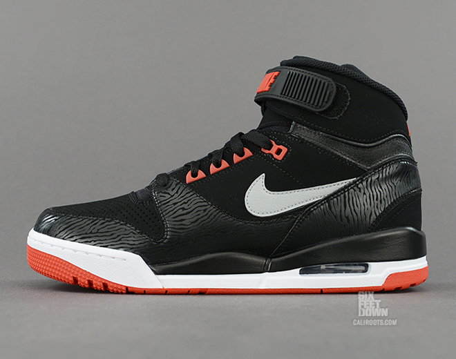 Nike Air Revolution in black silver red zebra profile