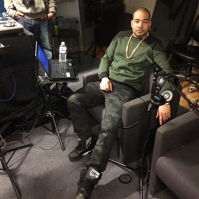 DJ Envy wearing Ewing 33 Hi Black