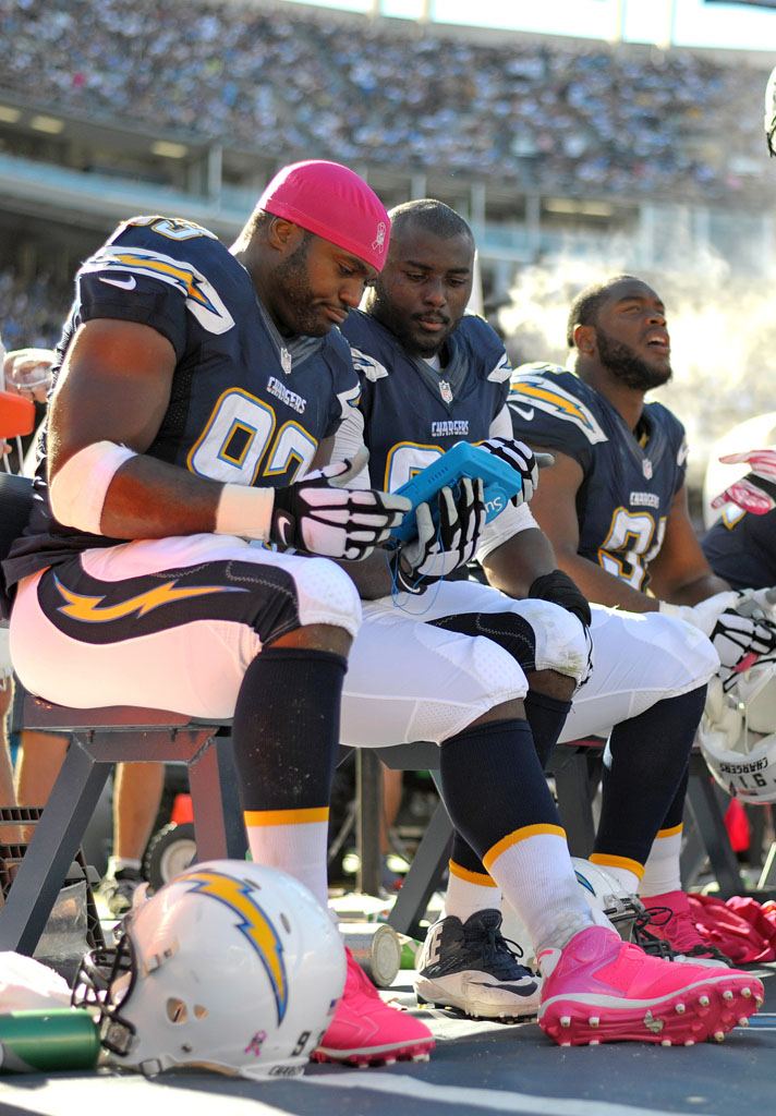 Dwight Freeney wearing Air Jordan VI 6 Breast Cancer Awareness Pink Cleats (1)