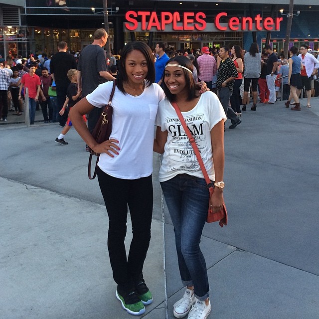 Allyson  Felix wearing Air Jordan XI 11 Low Green Snake