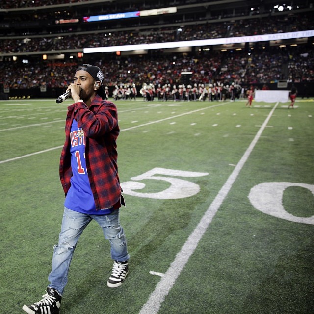 Big Sean wearing adidas Originals Rivalry Hi