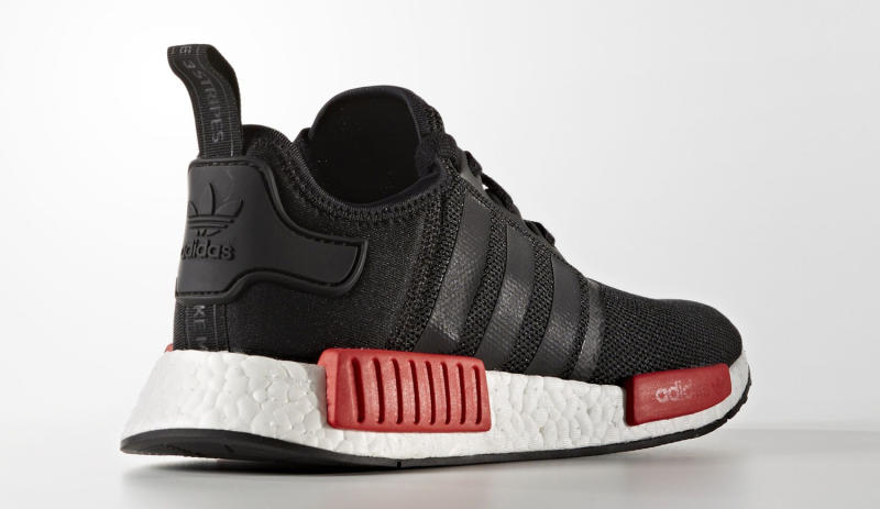 black nmds with red