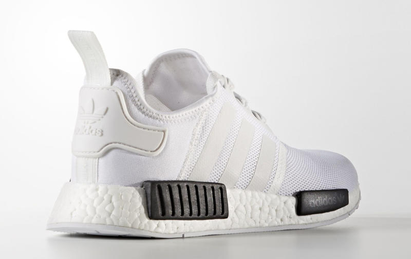 white and black nmds