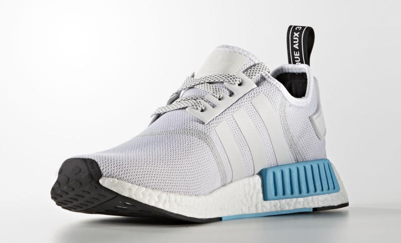 white and blue nmds