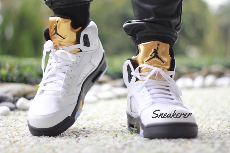 jordan 5 olympic gold on feet