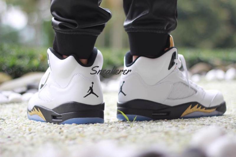 jordan 5 olympic gold on feet