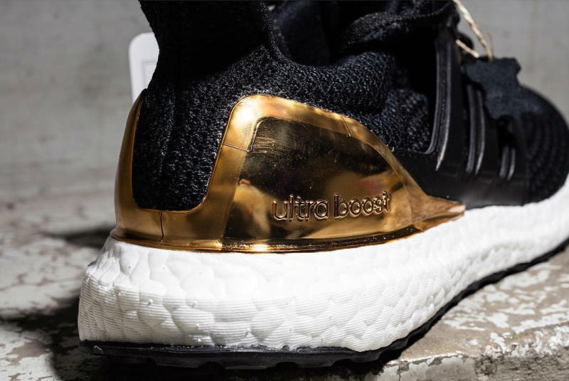 ultra boost x black and gold