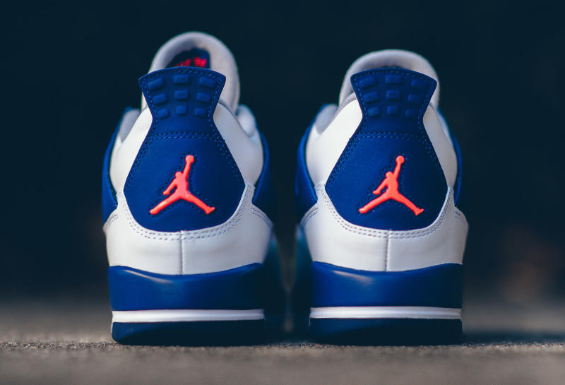 blue and orange jordans 4