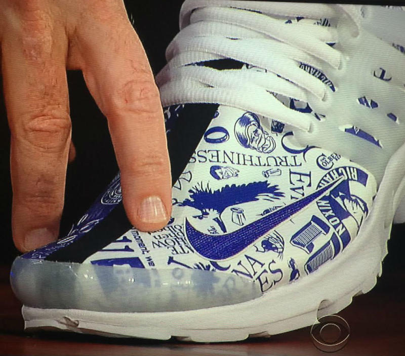 Phil Knight Gives Stephen Colbert Nike 