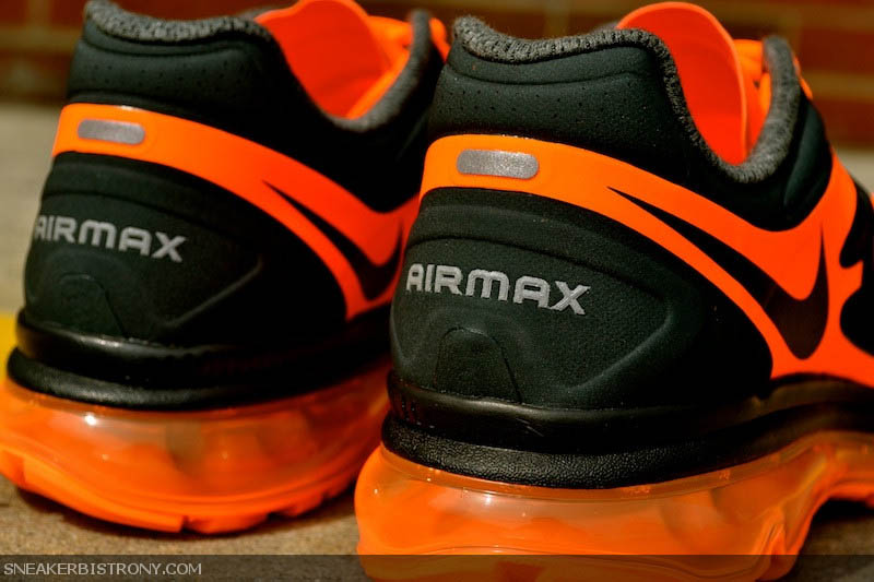 black nike air max with orange