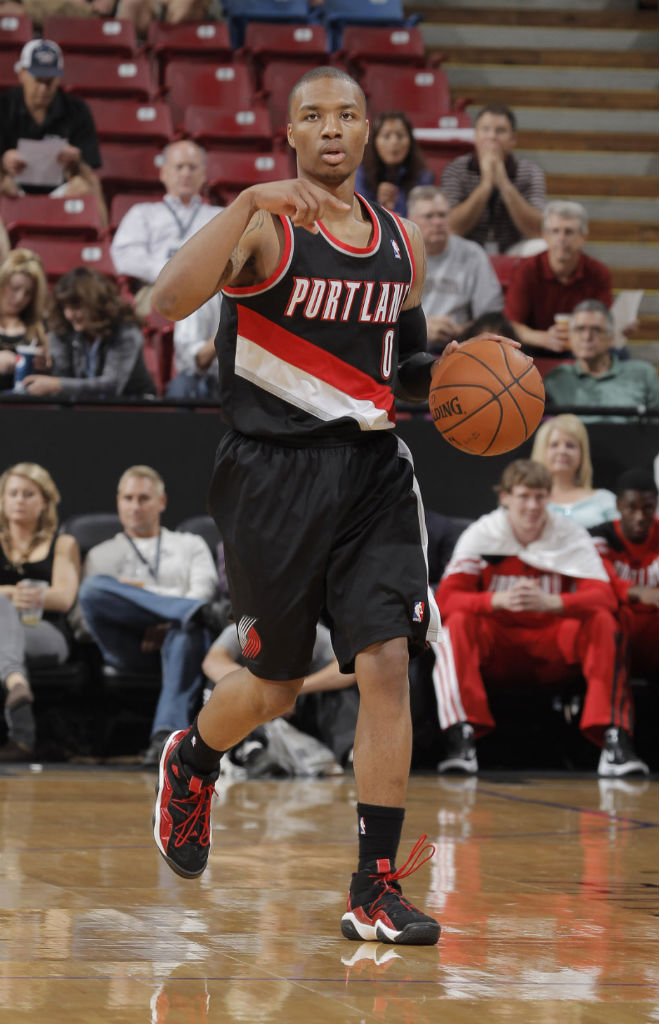 Damian Lillard wearing adidas Top Ten 2000 Black Red White