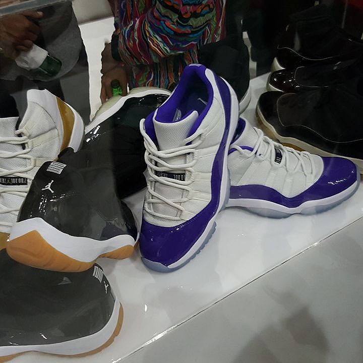 purple jordan 11 low