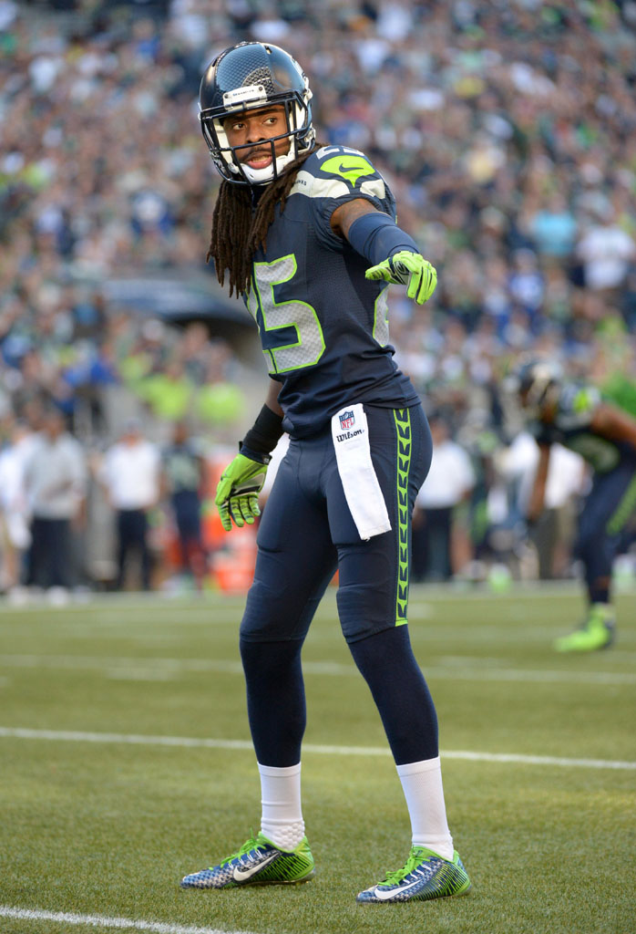 Richard Sherman wearing Nike Zoom Vapor Carbon 2014 Elite Seahawks