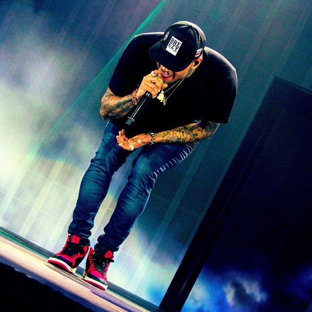 Chris Brown wearing Air Jordan I 1 Mid Black/Red