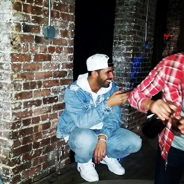 Drake wearing Air Jordan XII 12 OVO White