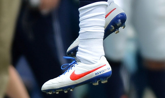 Darrelle Revis wearing Nike Tiempo Soccer Cleats