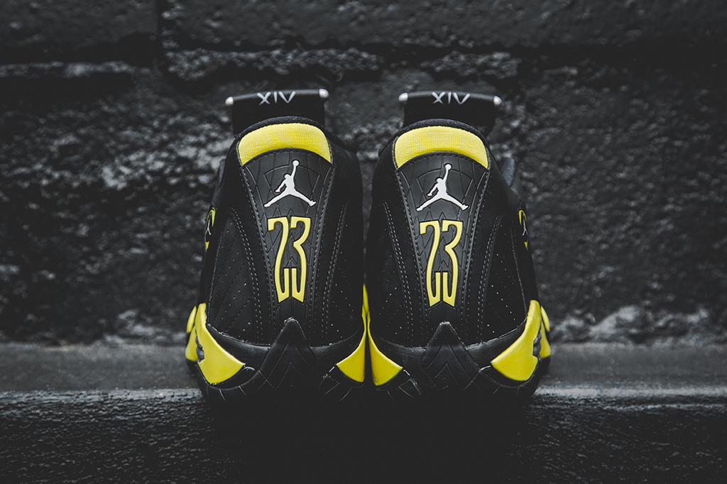 black and yellow jordan 23