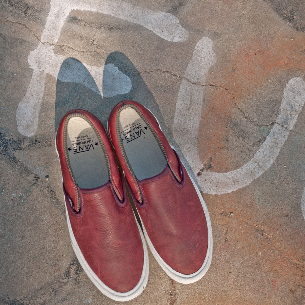 Vans red leather store slip on