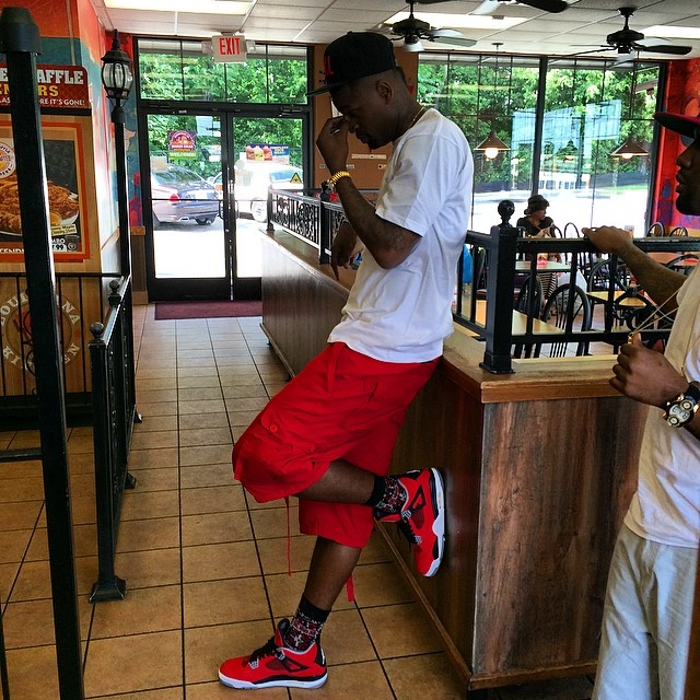 Stephen Jackson wearing Air Jordan IV 4 Toro