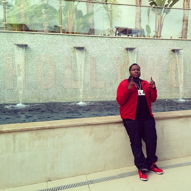 Sean Kingston wearing Air Jordan 4 Toro