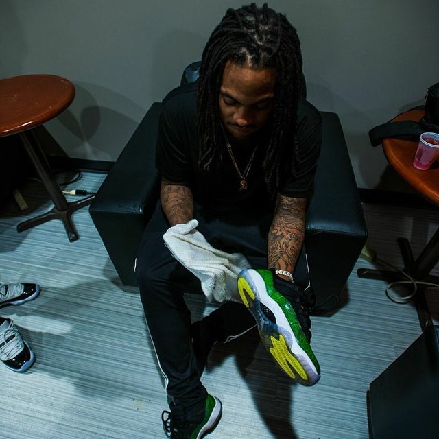 waka Flocka Flame wearing Air Jordan XI 11 Low Green Snake