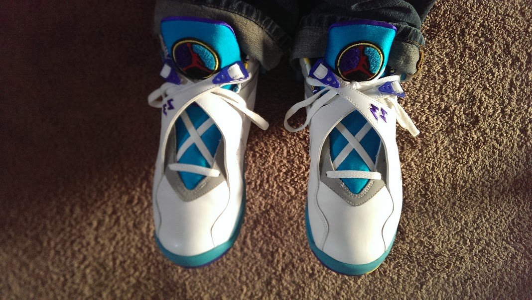 white aqua 8s on feet