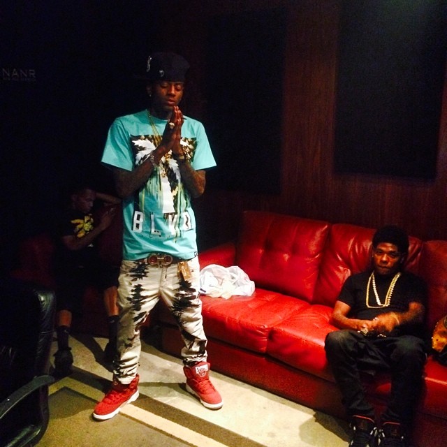 Soulja Boy wearing Ewing 33 Hi Red