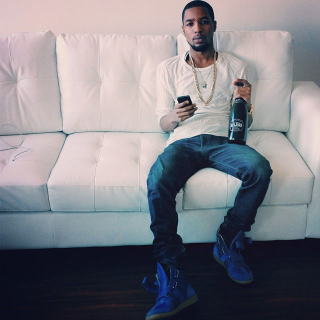 Rockie Fresh wearing Maison Martin Margiela Blue High-Top Sneakers