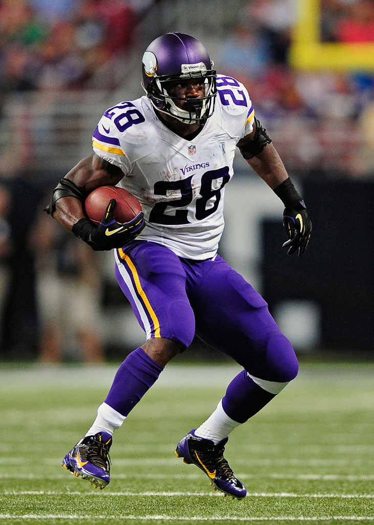 Adrian Peterson wearing Nike Alpha Pro Vikings