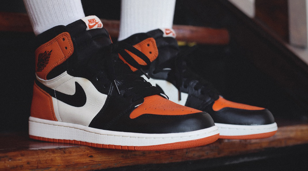 air jordan 1 mid shattered backboard on feet