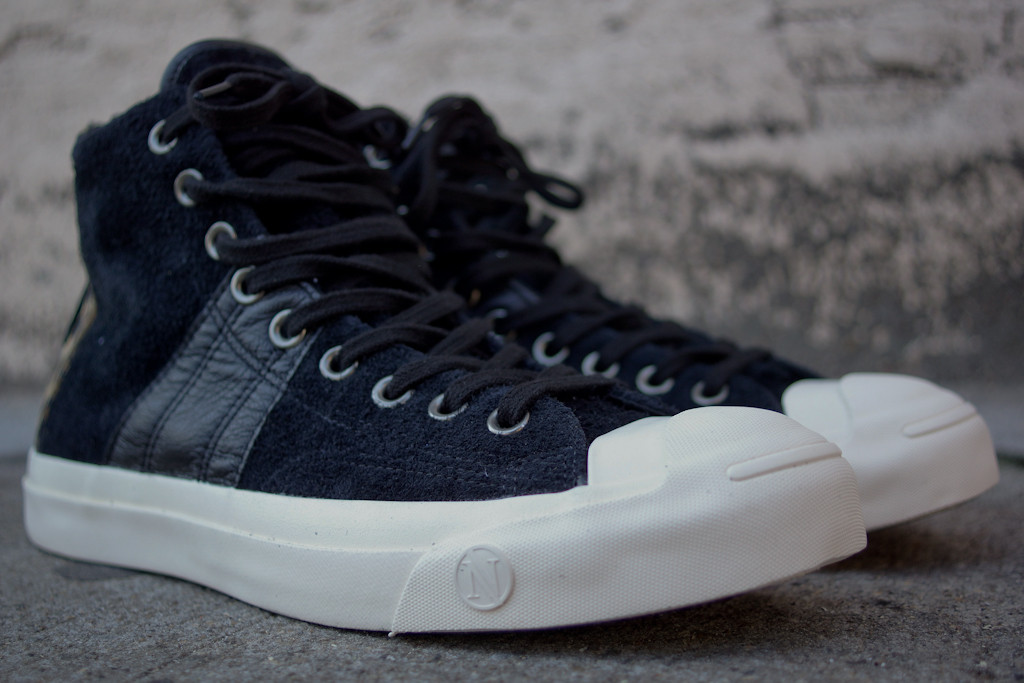 Invincible x Converse First String Jack Purcell Johnny in black leopard midsole logo