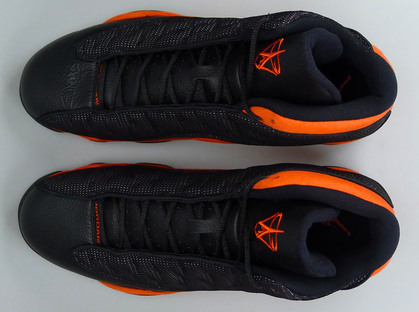 orange and black jordans 13