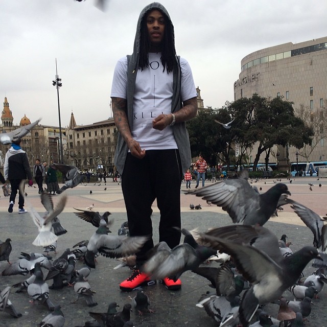 Waka Flocka Flame wearing Air Jordan 6 Retro Infrared 23